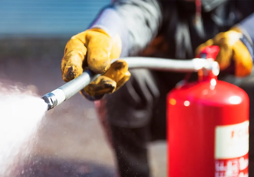 Fire extinguisher being serviced